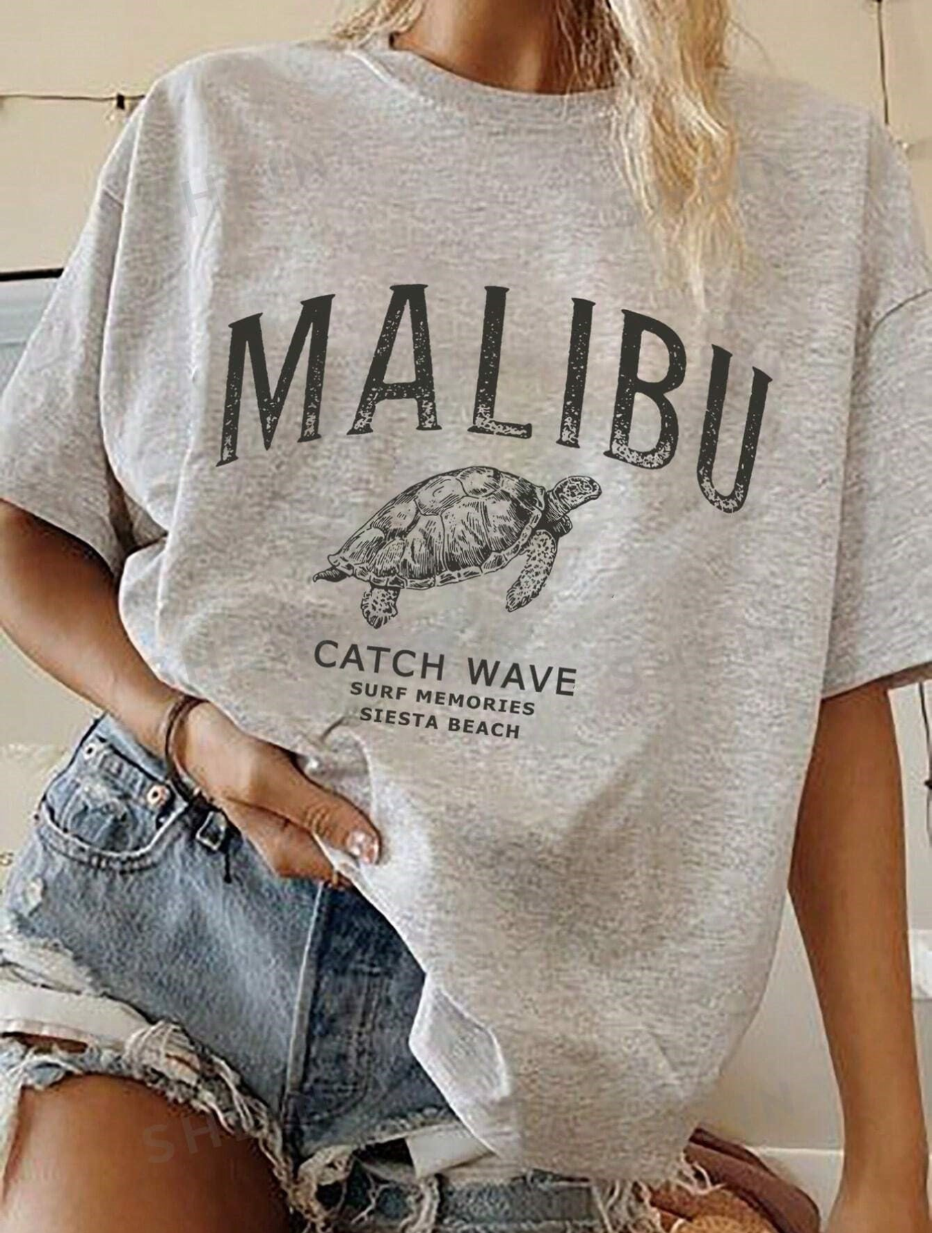 Camiseta Oversized Malibu Catch Wave EF MEIO